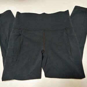 EUC Athleta Salutation Stash 7/8 Tights